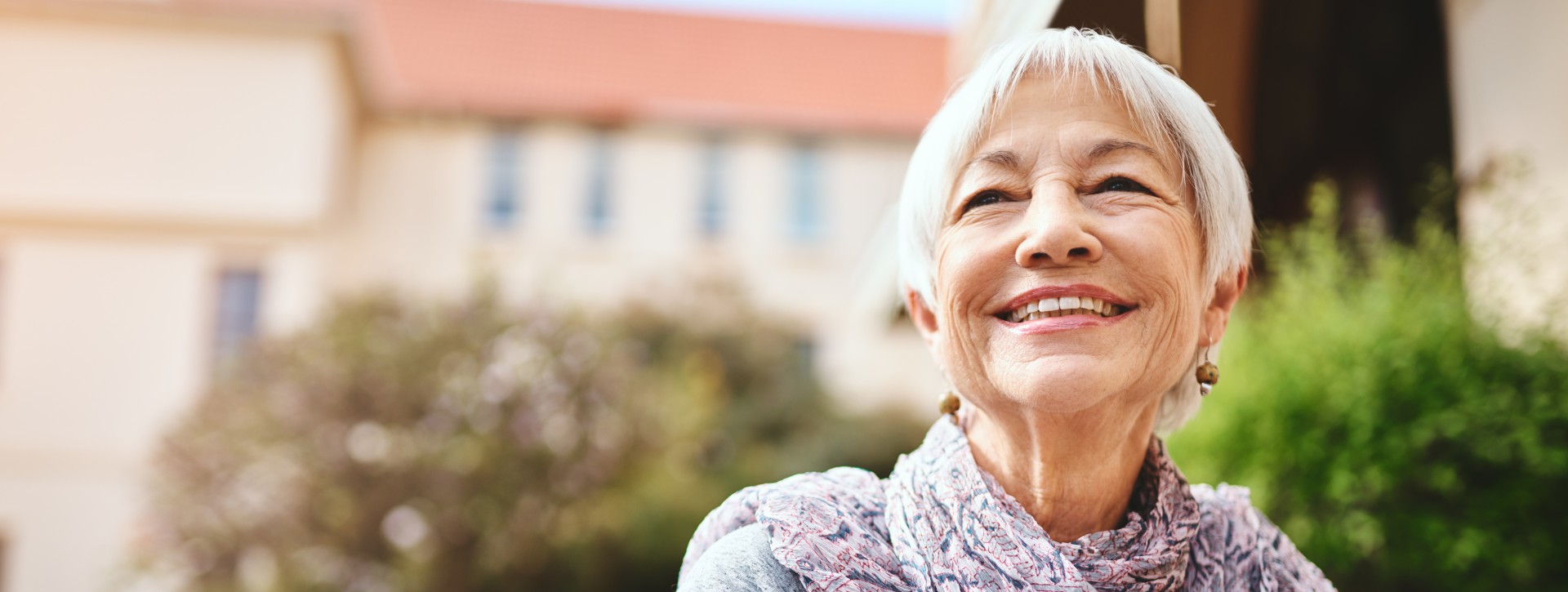 Happy older woman outside